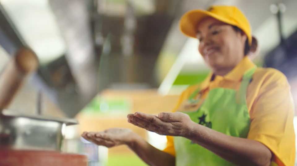 Laredo Taco Company employee woman making four trials